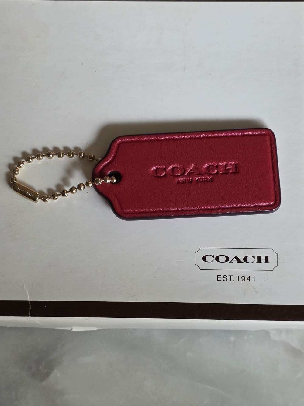 Coach Dark Magenta Leather Hangtag with Gold Chain